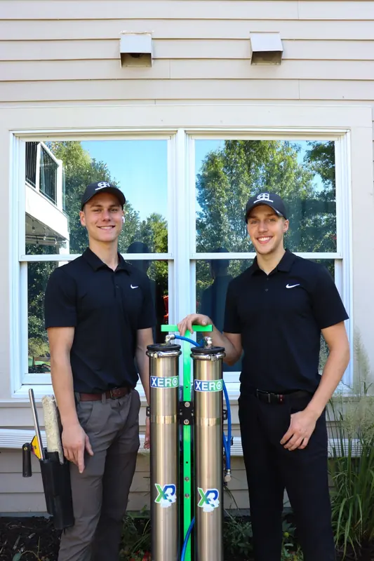 The Peregrine crew with their water-fed pole system